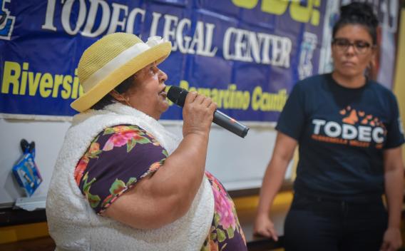 Isabel Coronel speaks to an audience during a Medi-Cal expansion outreach event at TODEC Legal Center in Perris.. 