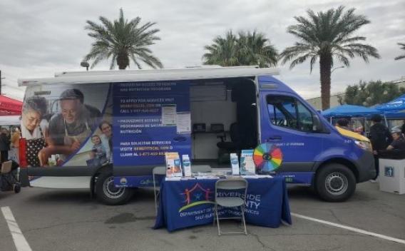 The Mobile Outreach Van stationed at an event in the Coachella Valley.