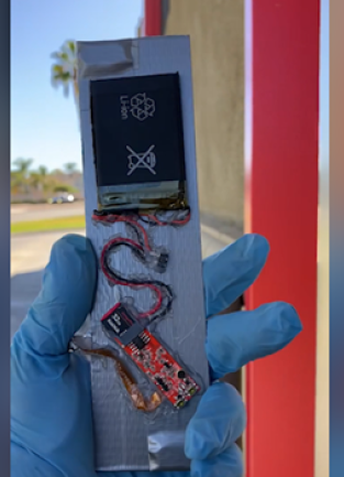 Investigators with the DPSS Special Investigations Unit find an illegally installed skimming device at an ATM in Riverside County. Skimming devices are used to capture account information and commit EBT theft.