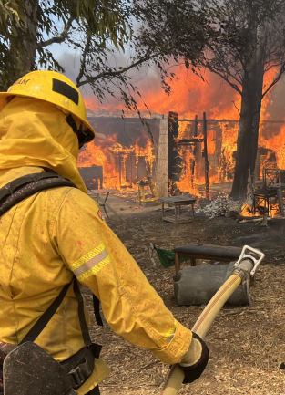 A firefighter battles the Verona fire near Homeland and Green Acres. Photo credit: Riverside County Fire Department Volunteer Photographer, Mike Nelson.